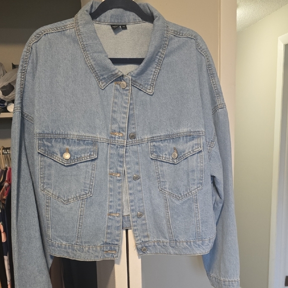 Hello Kitty Light Blue Denim Jacket with Pink Logo and Multi-Color Floral Art - Picture 2 of 3